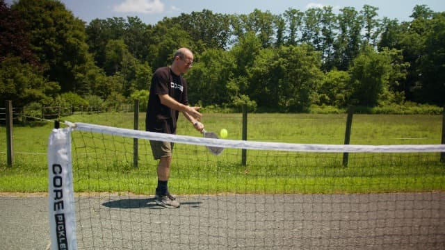CORE Pickleball Balls for Professionals and All Levels of Play - Set of 4-50 Balls with 40 Holes - Durable & Seamless Design - Premium Outdoor Pickleball Balls, Polypropylene - USA Pickleball Approved