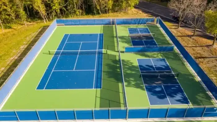 Two pickleball courts: side-by-side action